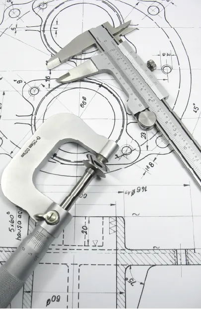 Calipers and micrometer on technical drawings